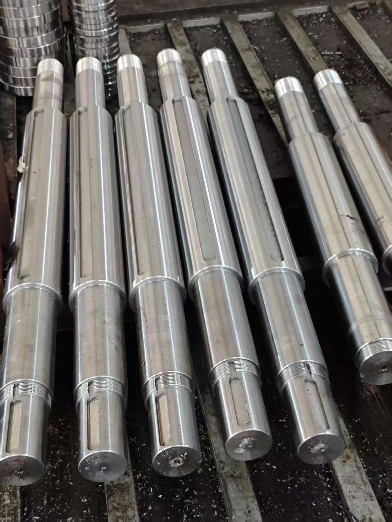 Precision machined tube mill shafts